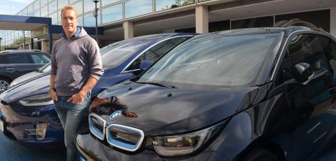 Ben standing by a BMW i3