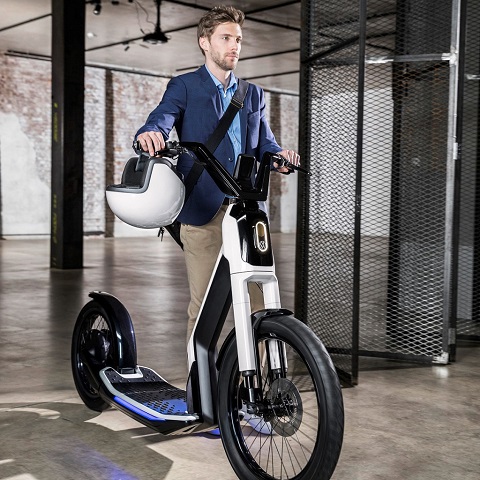 A man carrying folded VW Citystalker