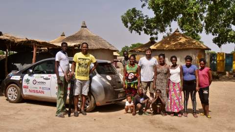 Helpful family in village of Borom, Burkina Faso. 20 per cent additional charge allowed me to continue to the next known charging point