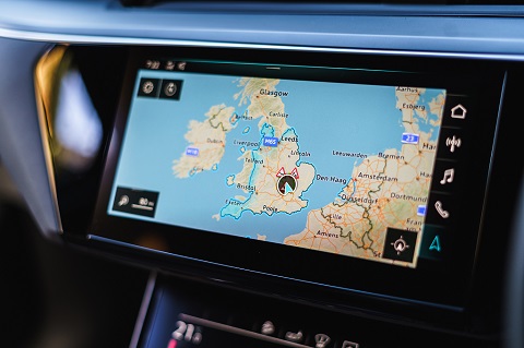 Interior close view on sat-navigation display of an Audi e-tron