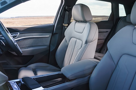 Interior view on driver and passenger seats of an Audi e-tron