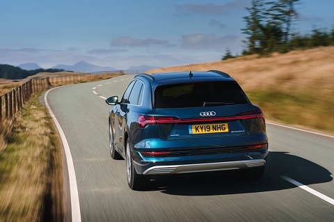 Exterior back view of a blue Audi e-tron