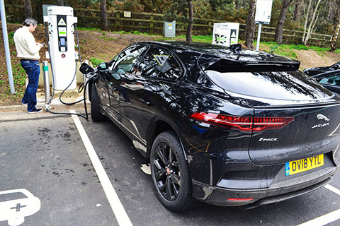 Jaguar I-PACE electric SUV charging at a charging point