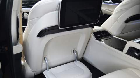 BMW 745Le rear seats with screens and fold out trays