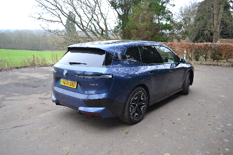 BMW iX rear three-quarter