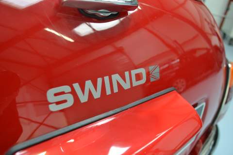 The Swind logo on the side of the Mini