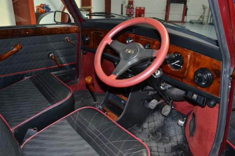 The red steering wheel of the Mini