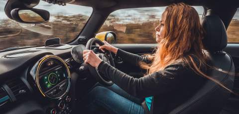 Louise driving the MINI Electric,MINI Electric rear view