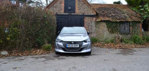 1 Peugeot e-208 front