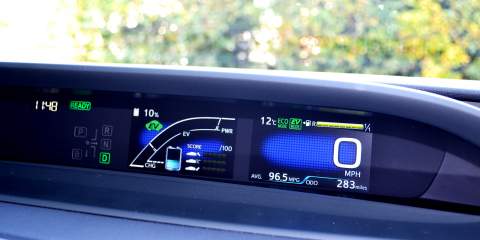 A screen in the car showing the range